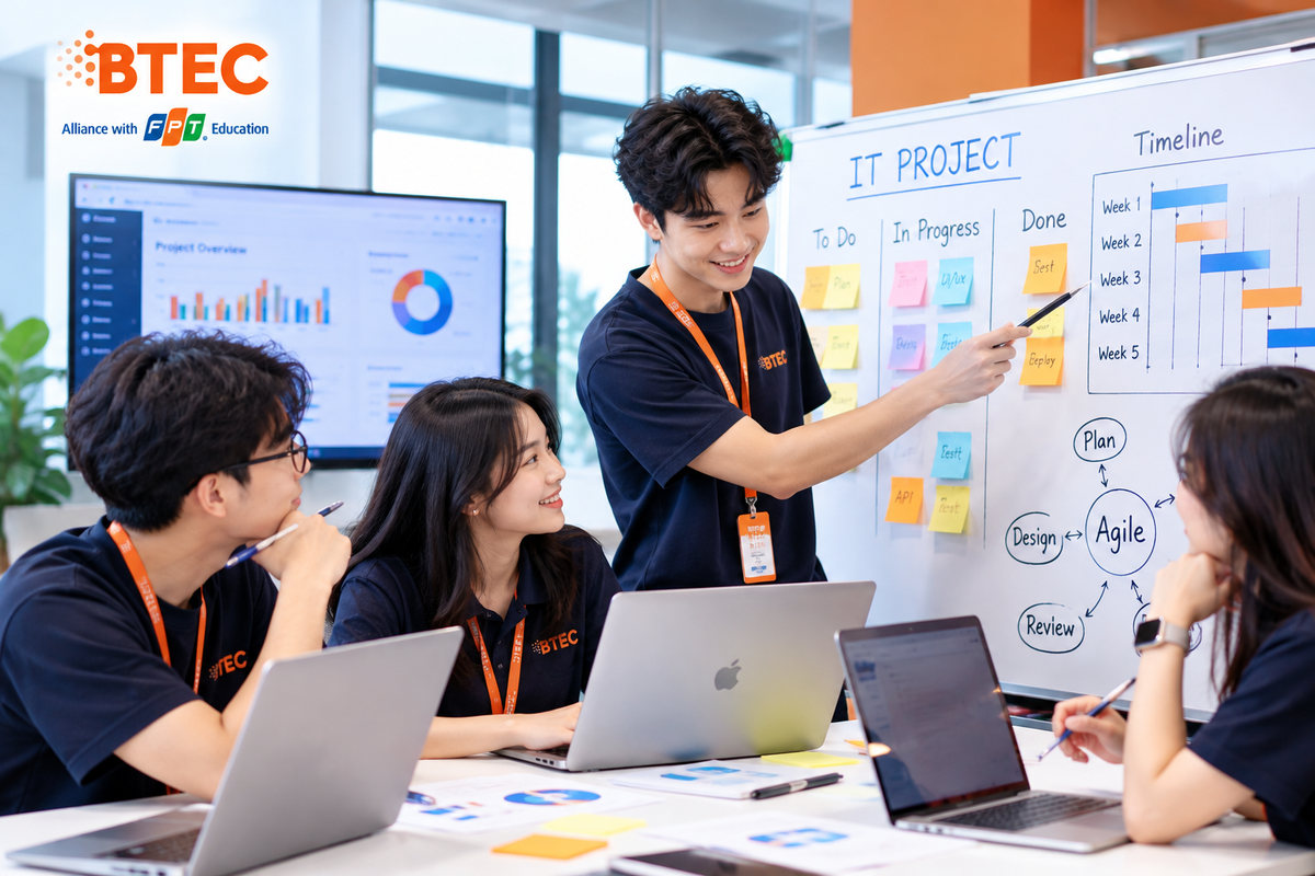 Sinh viên BTEC FPT trao đổi tiến độ công việc trong kỳ thực tập CNTT Hình ảnh sinh viên BTEC FPT trao đổi công việc cùng mentor trong môi trường doanh nghiệp công nghệ, giúp rèn kỹ năng báo cáo tiến độ, phối hợp nhóm và xử lý nhiệm vụ thực tế.